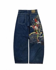 Design Sense Niche Drag Denim Jeans imprimés Jeans à jambes larges pour femmes Automne Pantalon taille haute en vrac Pantalon à jambe droite c7oe #