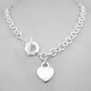 Diseño Collar de plata estilo TF para mujer Collar de cadena con colgante S925 Llave de plata esterlina corazón amor huevo marca Colgante Charm Ne3297