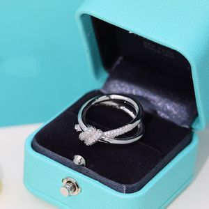 Diseñador 18k Anillos de nudo de oro Lujos Anillo doble anudado Joyería de mujer Moda Hombres y mujeres S925 Plata esterlina Letras clásicas Anillo de diamante Regalo de aniversario