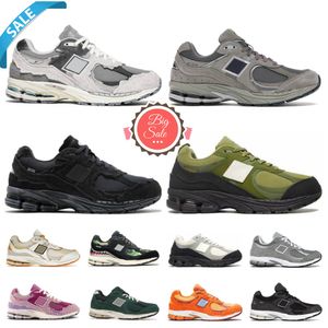 Diseñador 2002r Zapatos casuales 9060 PAQUETE DE PROTECCIÓN Rain en la nube Phantom Sneakers Athletic Sketers Pink Purple Grey Navy Salt Luxury 2002 R Salehe Bembury Entrenadores corredores