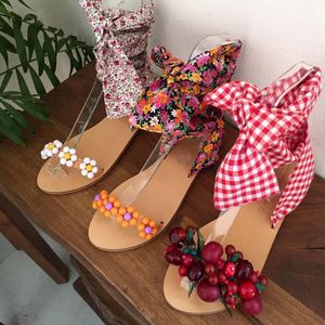 Designer 8 couleurs mode Bow sandales plates perlées à la main d'été femmes sandales plates décontracté confortable chaussures de plage fleur bride à la cheville grande taille