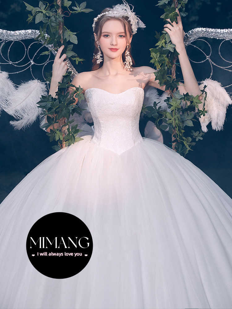 デザイナー「イノセンスの時代」ストラップレスでミニマリストのメインウェディングドレス2024新しい花嫁は女性のためのドレスを持って出かけます