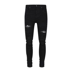 Designer Amirsspatchwork Jeans en cuir pour hommes pantalons déchirés noirs pantalons de rue américains pantalons slim pour hommes
