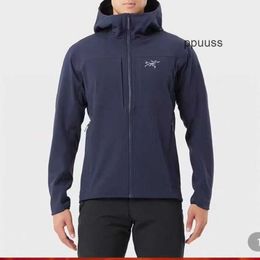 Designer Arcterys Vestes Authentiques Manteaux Arc Pour Hommes 2023 Automne / Hiver Nouvel Oiseau Oiseau Imperméable À Capuchon Soft Shell Sans Couture Pression Collée Manteau Chaud En Peluche