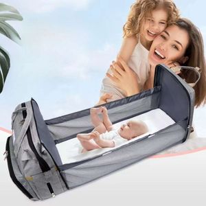 designer babyluiertas mummietassen voor babytassen met wieg bed reisrugzak met wieg waterdichte wandelwagenriemen H1110 groothandel gemakkelijk mee te nemen