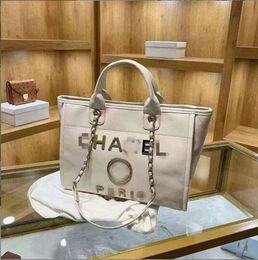 Bolsa de diseñador 2024 Handbag C Metal Pearl Beach Bag Blay Embrague de hombro Crossbody Bag Lady Luxury Bolss 2style