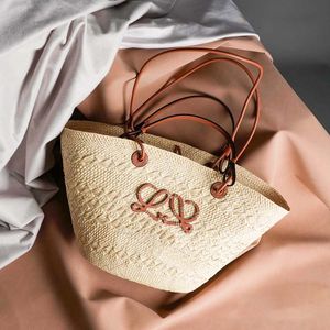 Bolsas de diseñador Bolsas de playa Bolso de lujo Bolso de paja Fashion Magos de hombros para mujer Posquejo Posquejo Posquy lienzo Floral Apliques Totos de moda Bolsos