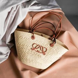 Bolso de diseñador Bolsos de playa Bolso de paja de lujo Bolso de hombro de moda para mujer Bolsos de mano de paja con personalidad para mujer