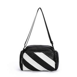 Bolso de diseñador Bolso de mano casual Bolso de hombro de lona tienda Hombro Mujer Hombre Mini bolso de hombro Letrero de metal Pochette suave Bolso de mano liso cruzado Bolsos de cadena única