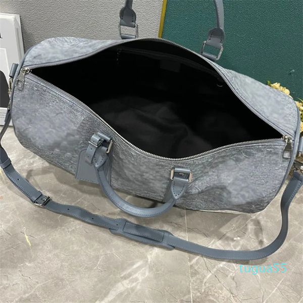 Sac de designer Sac de sport Sacs de gaufrage en denim délavé Rayures d'impression extérieure Lettre Soft Single Top Poignée Sac à bagages Sacs Duffel