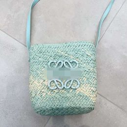 Bolsa de diseñador Fashion Lafite Grass Bag Woven Cloud Cloud Pleged Hollow Pure Handmade New Beach Bucket Teléfono