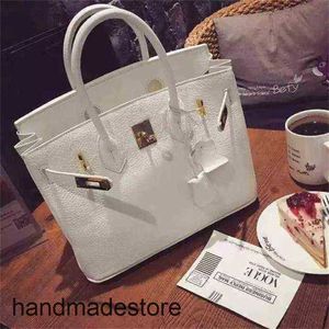 Sac de créateur sac à main 2024 Spring Platinum and Summer Coorean Fashion Cream White Lychee Pattern Celebrity Lady Buckle Handbag 58SZ