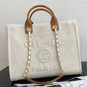 Sac de créateur sac à main sac fourre-tout de luxe sac à main portefeuille de portefeuille de voyage de voyage pour femmes et sac de chaîne de perle pour hommes