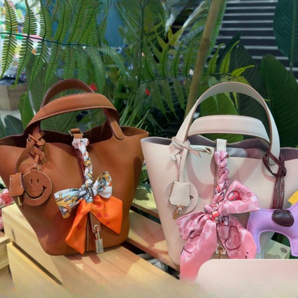 Bolsa de diseñador bolso de lujo bolso de bolso cruzado bolsos de cuero genuino bolso de playa bolso para mujeres bolsas de cubo de alta gama con gran capacidad, de moda y versátil