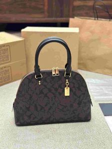 Bolsa de diseñador Luxury Women Katy Satchel Hand Bag Luggage Many Coacle Diseñadores Crossbody Bags Bolsa de hombro Classic Retro Shell Bag Casual Clutch