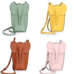 Bolsa de diseñador mini elefante lindo dinero en el hombro niña moda de cuero genuino de cuero suave billetera de monedas de bolos de tarjeta pequeña