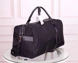 Bolso de diseñador Nuevos bolsos de lona al por mayor para hombres, bolso de equipaje de viaje clásico de alta calidad para mujer, bolso de cuero, bolso de moda