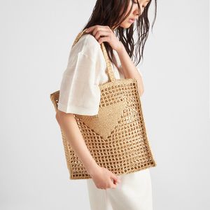 Designer tas schoudertassen strandtas mode handtas tassen mesh hol geweven boodschappentassen voor de zomer stro draagtas