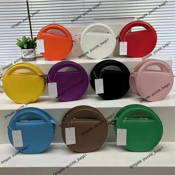 Bolso de diseño Bolso de hombro con estilo nuevo de cuero para mujeres de cuero para mujer Monocromio Monocromio redondo portátil Crossbody Bolsas de fábrica Ventas al por mayor