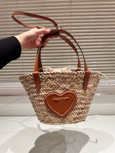 Sac de créateur Souet de panier de légumes tissés de mode pour femmes Sac de plage Paille sac fourre-tout Sac de seau de luxe sac à main