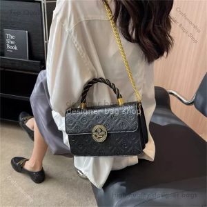 sac de designer sac fourre-tout design de niche française sac pour femme 2023 nouvelle mode sac à main à motif en relief sac à bandoulière à bandoulière unique pour femme 75% pas cher Outlet en gros