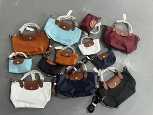 Designer tas vrouw nylon bakken schoudertassen handtassen portemonnees make -uptas dame kleine bakken strandzak