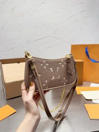 Sac de créateur Femmes Crossbody Sacs Sacs de chaîne Portefeuille Lady Easy Pouch sur des lettres de bourse en relief rayures de fleurs de luxe sacs à main de marque M81066 M80349 Nouveau