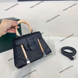 Bolso de diseño Bolso para mujeres 90% Factory Ventas calientes Al por mayor de alta calidad Dientes de perros de cuero de alta calidad Saigon Bag Many Handheld Un hombro Mano de cuerpo cruzado