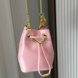Sac de designer Femmes Luxurys Sac à main en cuir laqué mini sac seau nouveau sac à bandoulière unique sac à bandoulière mini-bouche rouge sac femme sac