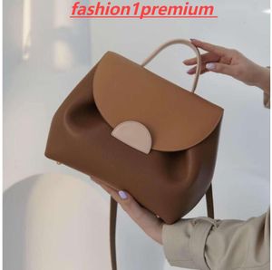 Bolso de diseñador Bolso cruzado de hombro para mujer Bolso de retales de piel de vaca con una base que no es fácil de ensuciar Cartera con patrón de lichi Totes Moda favorita