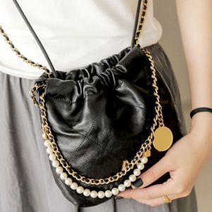 Designer tassen en terwijl de nieuwe 2023 Dragon Candy Color Pearl Chain Mini Bag schoudertas een schouder gedragen handtas mode lederen handtas