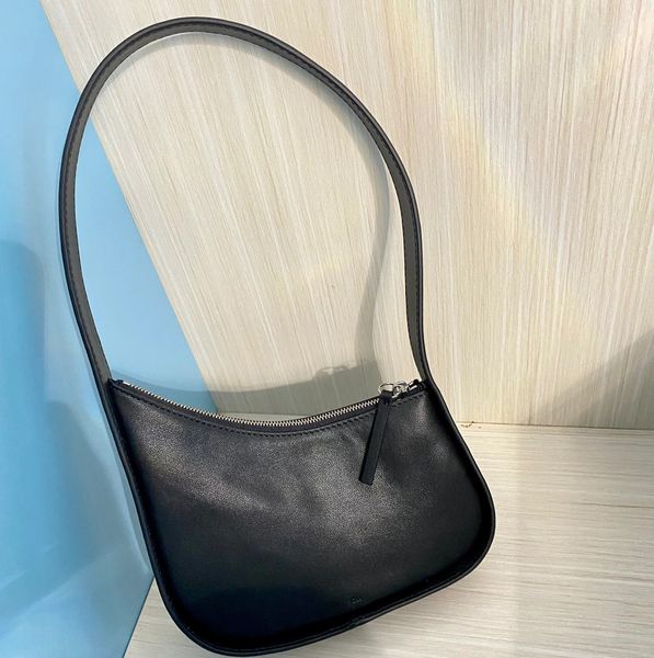 Bolsos de diseñador Famoso bolso de mano de lujo para mujer, diseño de nicho de moda, bolso de hombro para axilas de piel de vaca de alta calidad, bolsos vagabundos para ir al trabajo