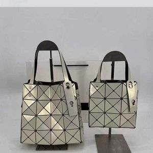 Designer tassen voor vrouwen opruimen Verkoop Grid Womens 2024 Bag glanzende diamant Japanse eenschouder draagbare originele modieuze en vierkante veelzijdig