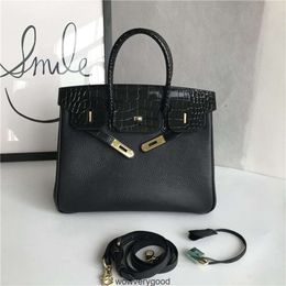 Sacs de créateurs Fourre-tout de mode de luxe 2023 Nouvelle couche de tête en cuir souple Modèle de litchi en peau de vache avec motif de crocodile Sac à bandoulière unique Oblique Straddle Handheld Gen