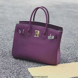 Sacs de créateurs Fourre-tout de mode de luxe Automne et hiver nouvelle couche supérieure sac en cuir de vache anémone de mer sac pour femme en cuir violet polyvalent en cuir super doux une épaule wom