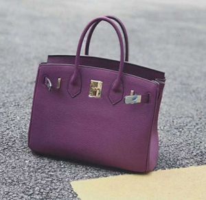 Bolsos de diseñador Totes de moda de lujo Otoño e invierno Nueva capa superior Bolsa de cuero de vaca Anémona de mar Cuero púrpura Bolso para mujer Versátil Cuero súper suave Uno de alta calidad