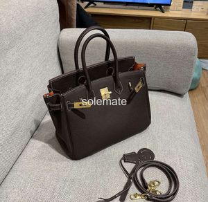 Sacs de créateurs Bottes de mode de luxe sac en cuir togo avec sac à main orange à l'intérieur de la couche supérieure à la mode