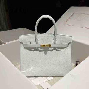 Bolsas de diseñador Bolsos de avestruz Bag Bag de cuero Milk Shake White White 3025Mini Patrón de litchi portátil pequeño, tiene logotipo RJ