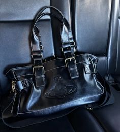 Bolsas de diseñador Bolsa Saturno Bag Vintage Black Leather Hobo Bolsillo cruzado