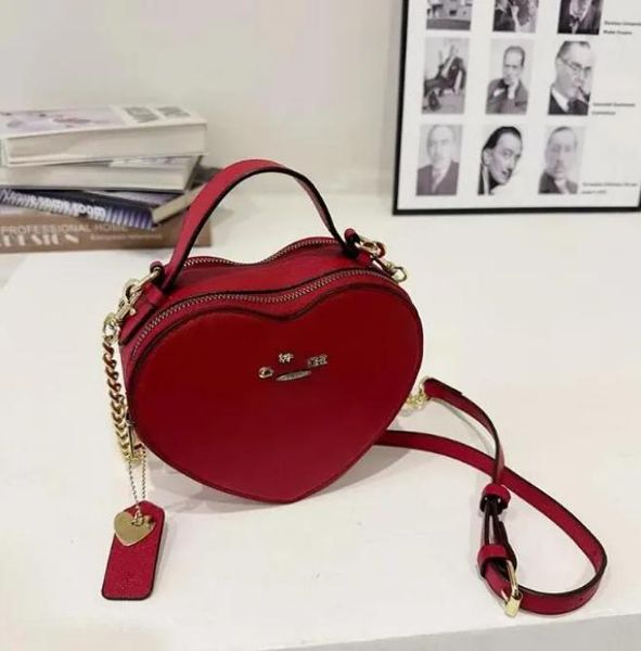 Bolsos de diseñador Bolso de mujer Carteras Bolsos de hombro para mujer Bolso de mano Mochila de moda Flor vieja Amor Bolso de mujer Corazón Bolso cruzado Monederos C00207