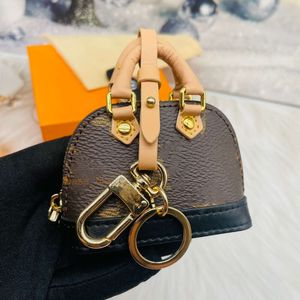 Designer Bags Dames Key Wallets Brown Letter Mini BEACKPACK Luxe merk Ladies Shell Dog Coin portemonnees met sleutelhangerzak hanger charmes