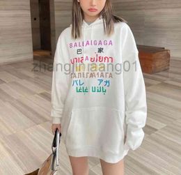 Diseñador Balanciagas Hoodie Hombre Mujer Vintage Luxe Fashion New Seven Language Color Letter Hooded Loose Pullover