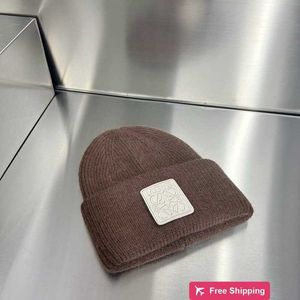 Gorros de bola de diseñador Nuevo Luojia Gorro tejido con pelo de conejo Gorro de lana versátil de moda y de alta calidad para mujer Gorro grueso y cálido para el invierno MNM4