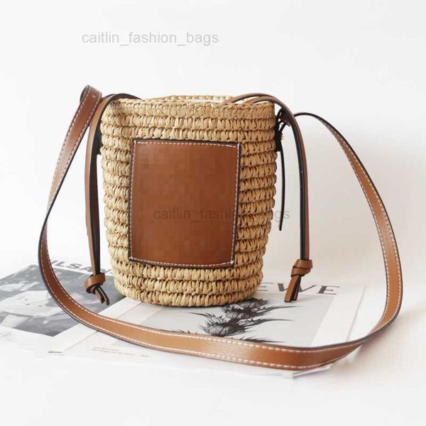 Bolso de playa de diseñador Estilo clásico de las mujeres de verano Moda Bolso tejido a mano puro Lafite Grass Vacaciones de verano Monedero tejido Venta al por mayor de alta calidad