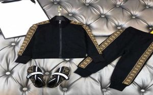 Designer Black Kids Tracksuit Clothing Jackets broek 2pics Sets Boys Girls Autumn Cotton Childrens Sports Wear4588784