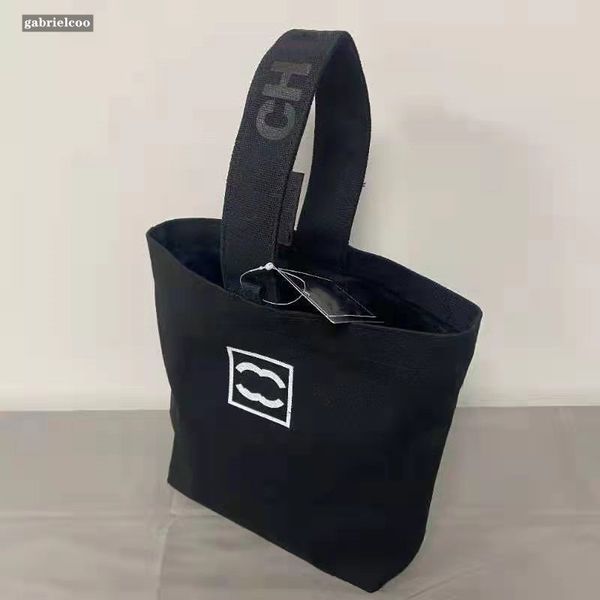Diseñador negro blanco bolso de lona para mujer logotipo de letra clásica bolso portátil de moda para mujer bolso bento bolso de compras de viaje