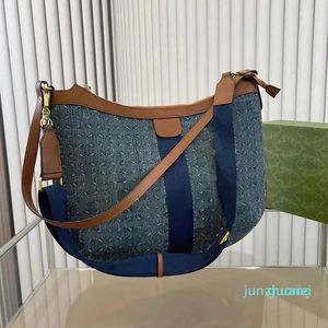 Diseñador -Bolso de mezclilla azul 42 cm Bolso bandolera grande vintage Bolsos de media luna Bolso de mujer Bolso de hombro de cuero de lona Raya roja azul