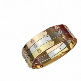 Bracelet de créateur 18k couple en or bracelet de haute qualité hommes femmes d'anniversaire cadeau bijoux de la fête des mères avec givre de tournevis ornements en gros de l'ACCO U81J #