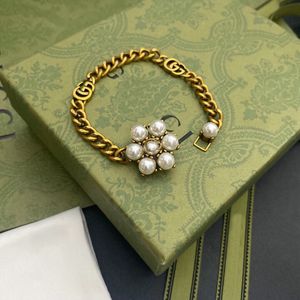 Bracelet de créateur chaîne à breloques plaqué or, chaînes de perles de fleurs, bijoux à la mode, cadeau pour femmes