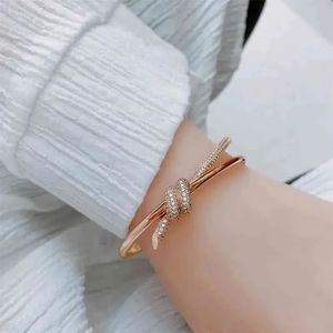 Bracelet de créateur bracelet en or dames bracelet en acier inoxydable nœud couple lisse bracelet dames mode bijoux de luxe bijoux de la Saint-Valentin
